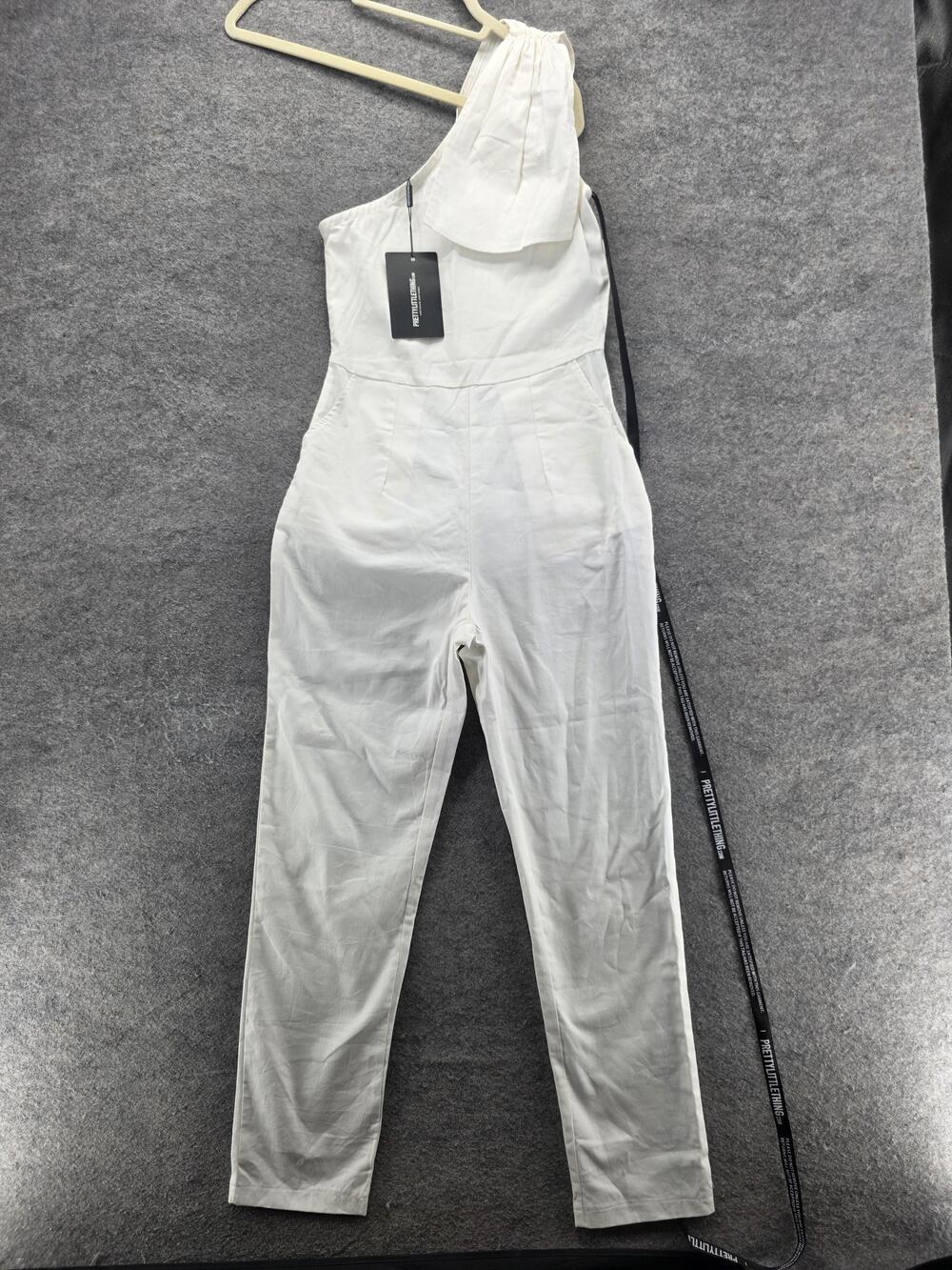 PrettyLittleThing Jumpsuit Womens US 0 White One Shoulder Woven Sleeveless Slim